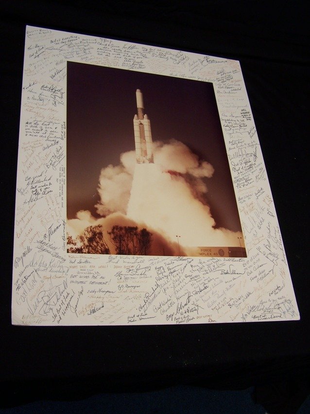 Employee Signed Titan Rocket Photo: these were typically retirement gifts all real signatures of employees the photo and matting measures 16 X 20 in