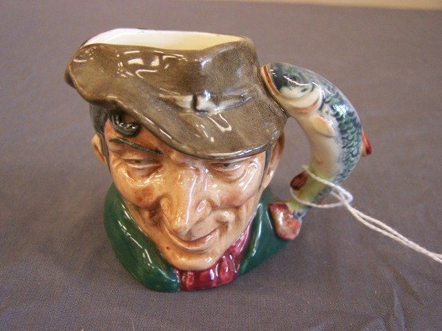 Vintage Royal Doulton Toby Mug Stein: Maker Royal Doulton Name The Poacher Numbered 321/54 measures 2 1/2 in tall