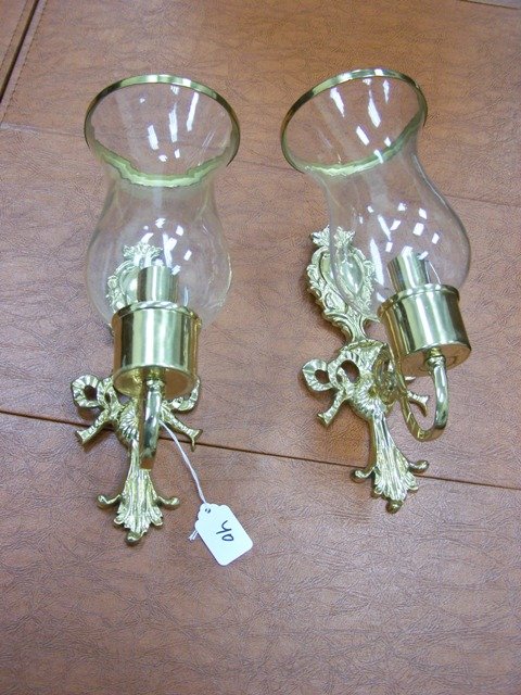 Brass and Glass Pair of Wall Sconces: Measures 11 in tall with globe in it Beautiful decorator items