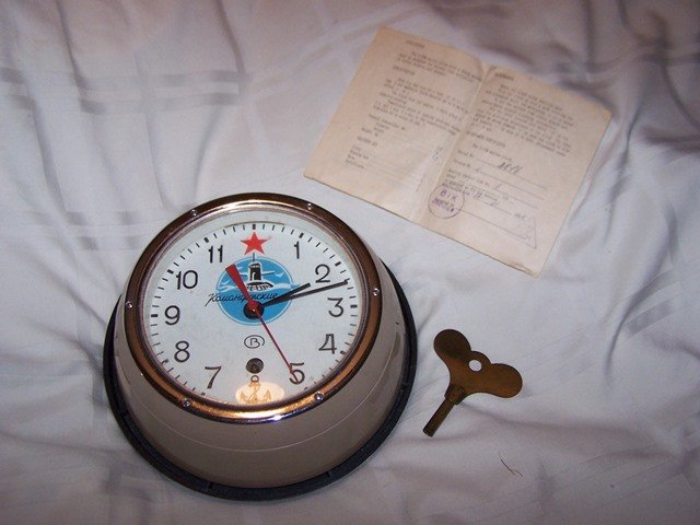 Russian Soviet Submarine Boat Ship Clock Military: with paperwork and key wound up and currently running