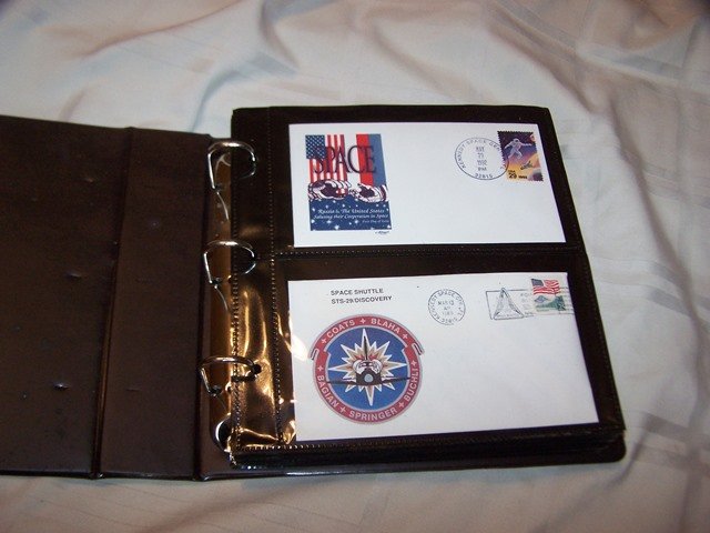 NASA Space Shuttle era First Day Cover Collection: 72 different first day covers with album in sleeves mostly space shuttle covers please see photos