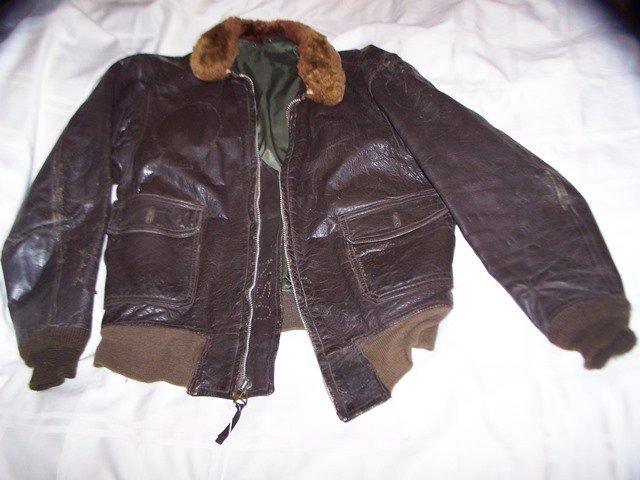 WW11 Leather Flight Bomber Jacket Marine ? Painted: Uncommon leather jacket size 42 has some painting on back hard to read please see photos