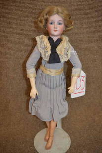 14 1/2" SIMON & HALBIG Mold 1469 Bisque Head: 14 1/2" SIMON & HALBIG Mold 1469 Bisque Head lady doll w/ lt brown mohair wig, fixed blue eyes, JTD compo lady body, wearing blue/grey period style dress w/ ivory accents w/ black bow. Brown leather h