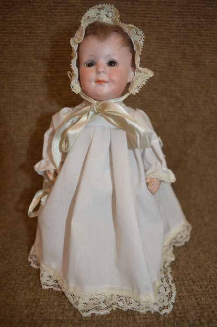 7 1/2" Bisque Mold AM 550 4/0 DRGM AMarseille: 7 1/2" Bisque Mold AM 550 4/0 DRGM Armand Marseille with brown sleep eyes, brown mohair wig, D/M, redressed in vintage whites w/bonnet