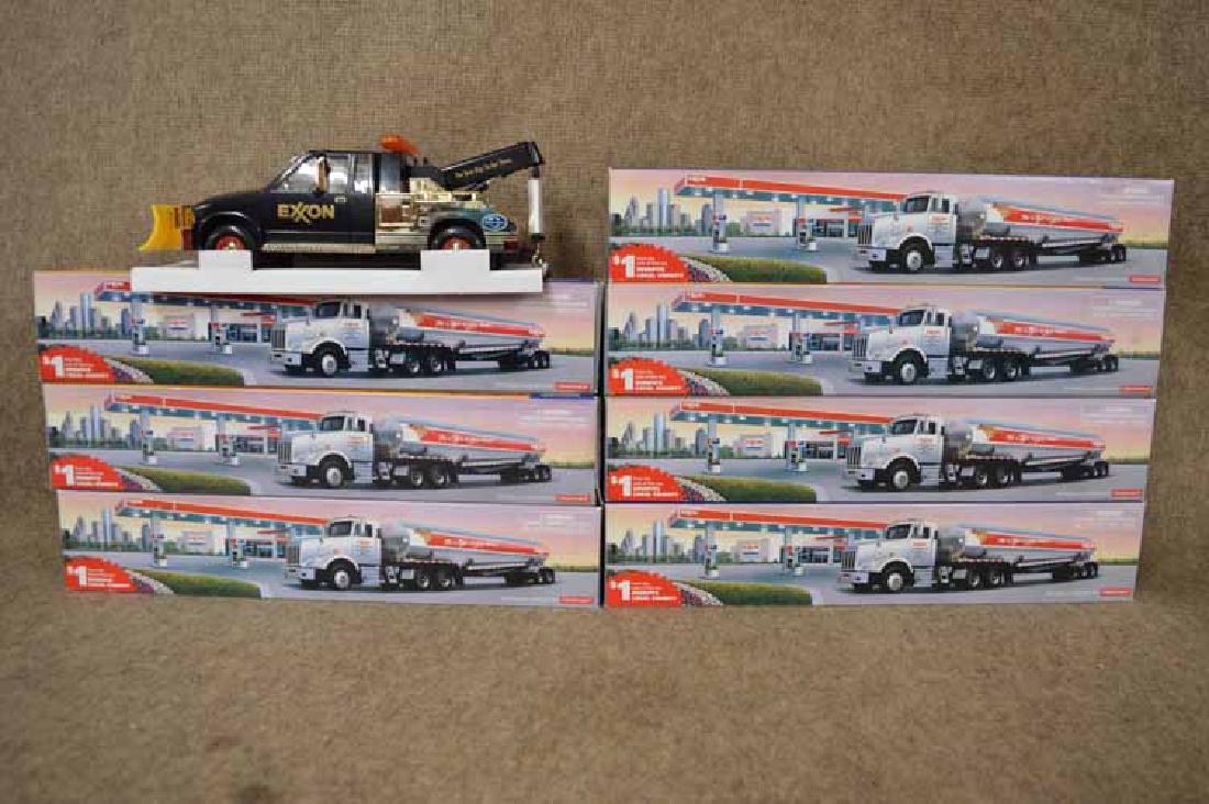 (8) PLASTIC TRUCKS: GRP OF (8) PLASTIC TRUCKS IN ORIG BOXES TO INC: EXXON TRUCK W/PLOW, (7) EXXON TANKERS ALL IN ORIG BOXES