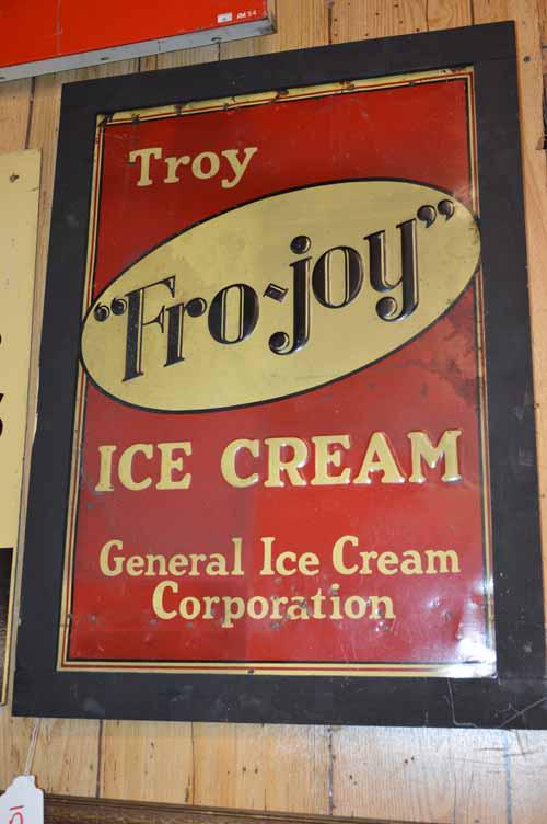 TROY "FRO-JOY" SIGN: TROY "FRO-JOY" ICE CREAM TIN SINGLE SIDED SIGN IN WOODEN FRAME - 22" X 31"