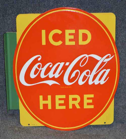 COCA COLA FLANGE SIGN: PORCELAIN ICED COLD COCA COLA FLANGE SIGN MARKED P&M '51 IN LEFT CORNER 18 1/2" X 20 1/2" MADE IN CANADA