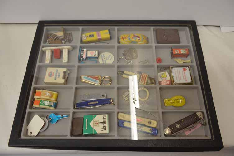 KEY CHAINS, JACK KNIVES, LICENSE PLATE TAGS ETC: COLLECTION TO INC: AUTOMOTIVE JACK KNIVES KEY CHAINES, TOY CARS, TOY GAS PUMPS, CLICKER, MATCH BOXES, LICENCE PLATE KEY TAGS, ETC, 12 1/2"W X 16 1/2"L X 1" D