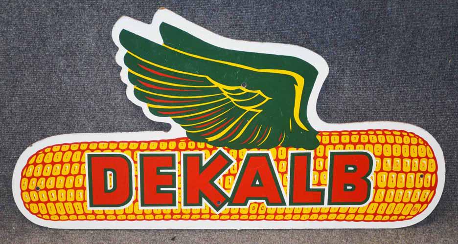 DEKALB SIGN: "DEKALB" MASONITE PRESSED BOARD WINGED CORN SIGN MARKED 'DC 86'