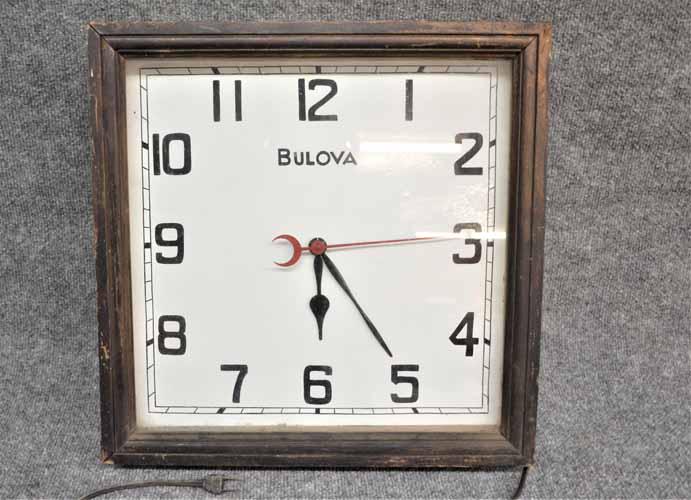 BULOVA CLOCK: BULOVA SQUARE ELECTRIC WALL CLOCK W/ WOODEN FRAME, TIN PAINTED FACE.