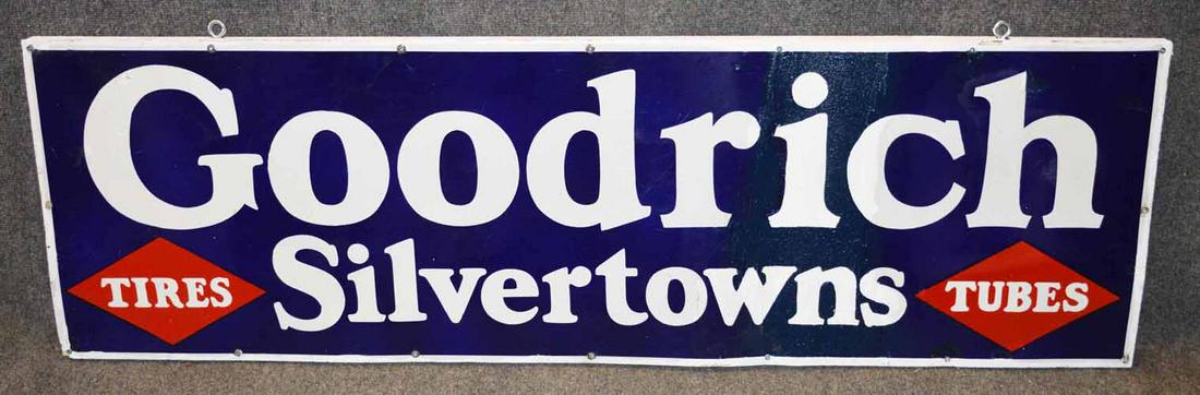 GOODRICH TIRES SIGN: PORCELAIN "GOODRICH TIRES" SIGN, SOME TOUCH UP AND MOUNTED ON WOOD FRAME D CIRCA 1930'S 58"L X 18"H "