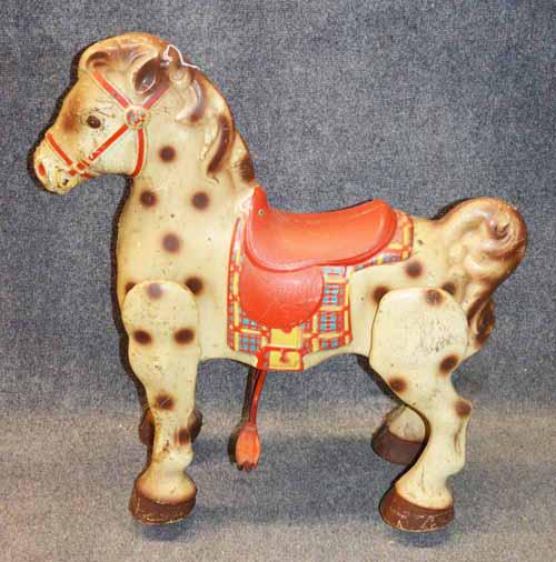 CHILDS MOBO RIDE ON HORSE: CHILDS MOBO RIDE ON HORSE, VERY SLIGHT REMNANT OF DECAL ON CHEST, SURFACE RUST, SCRATCHES, PAINT FADE, MISSING REINS, 26"L X 30"H X 13"D (PEDALS)