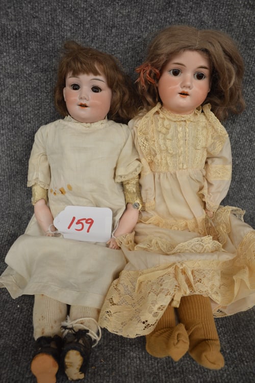 (2) A.M. BISQUE DOLLS: (2) 19" A.M BISQUE DOLLS TO INC: A.M. BABY BETTY & A.M. 370, BOTH HAVE BROWN WIGS, ONE HAS BROWN FIXED EYES, ONE BROWN SLEEP EYE, BOTH HAVE JTD KID BODIES, ONE HAS BISQUE FOREARMS & ONE HAS COMPO ARMS