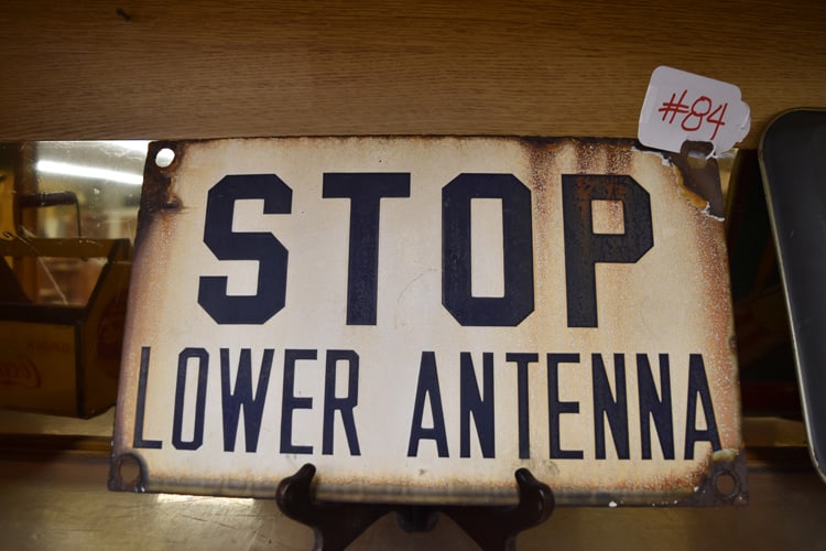 "STOP LOWER ANTENNA" SIGN: SINGLE SIDED PORC. "STOP LOWER ANTENNA" SIGN