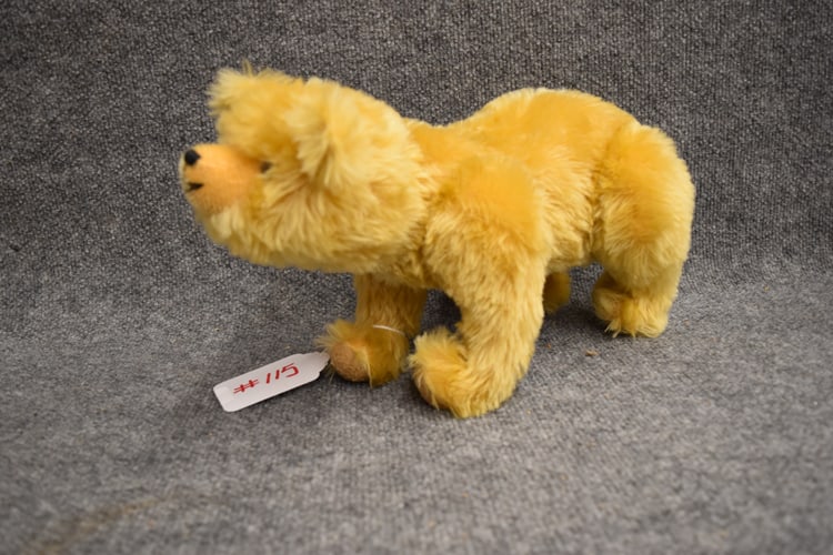 JOINTED STANDING GOLD BEAR: JOINTED STANDING GOLD BEAR - NO TAG OR BUTTON - 14" L X 8 1/2"H WITH JOINTED LEGS AND HEAD - IS SIGNED ON PAW (CAN NOT READ)- DATED 1991