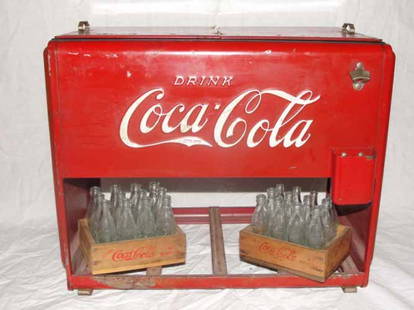 1939 Salesman Sample Coca Cola Cooler: 1939 Salesman Sample Coca Cola Cooler w/2 Miniature Cases of Coca Cola Bottles. Has Paper Coke Cooler Reference Cards Inside Lids, Cap Holder & Bottle Opener on Side