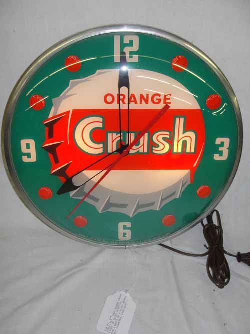 1962 Orange Crush Clock (reverse ptd face cracked): 1962 Orange Crush Light Up Clock with Bottle Cap - 15" diameter.. Reverse paited face is cracked. Doesn't show up in photo. If you have left a bid on this item please revise.