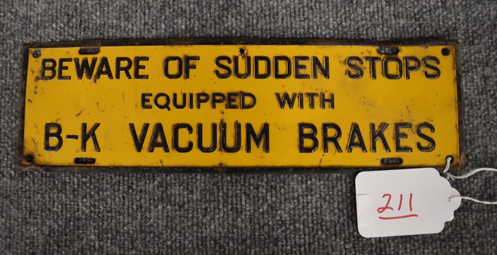 B-K VACUUM BRAKES" SIGN: METAL 1950'S "BEWARE OF SUDDEN STOPS EQUIPPED WITH B-K VACUUM BRAKES" SIGN - - 14" X 4 1/4"