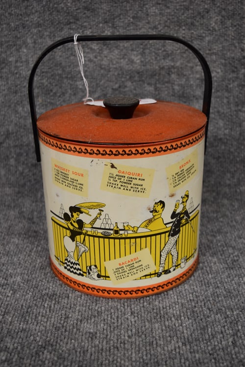 INSULATED METAL ICE BUCKET: INSULATED METAL ICE BUCKET - "HOT STUFF COLD STUFF" HAS COCKTAIL RECIPIES, HAS PLASTIC HANDLE, ORIG TOP - MEASURES 8" H X 7 1/2" DIAMETER