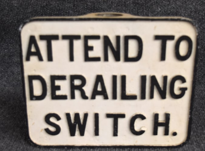 CAST IRON RAILROAD SIGN (1 of 2)