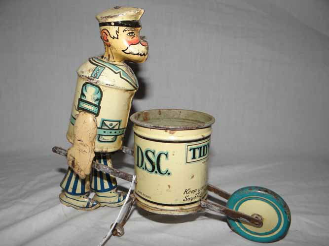 Wind Up Tidy Tim Toy by Marx: Tin Wind Up Tidy Tim Toy by Marx - 8"L x 8"H