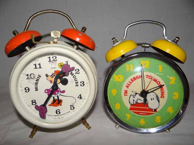 Snoopy & Minnie Mouse Alarm Clocks: Snoopy 1958 Alarm Clock -metal body/Minnie Mouse Walt Disney Alarm Clock -Tin & plastic body - made in Germany