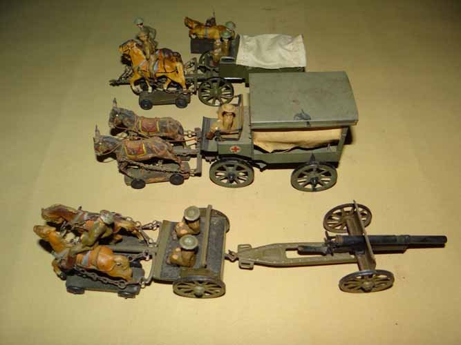 Grouping of Toys: Toys to Inc: 3 Horse & Wagon Teams & One Mounted Soldier made by Lineol - Largest is approx,. 13" x 3"