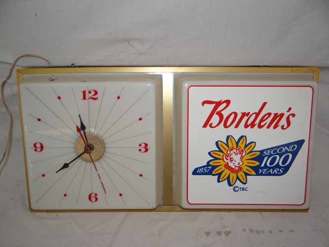 Borden's Light Up Clock Sign: Metal & Plastic Borden's Light Up Clock Sign - 24 1/2"W x 12 1/2"H x 5" D