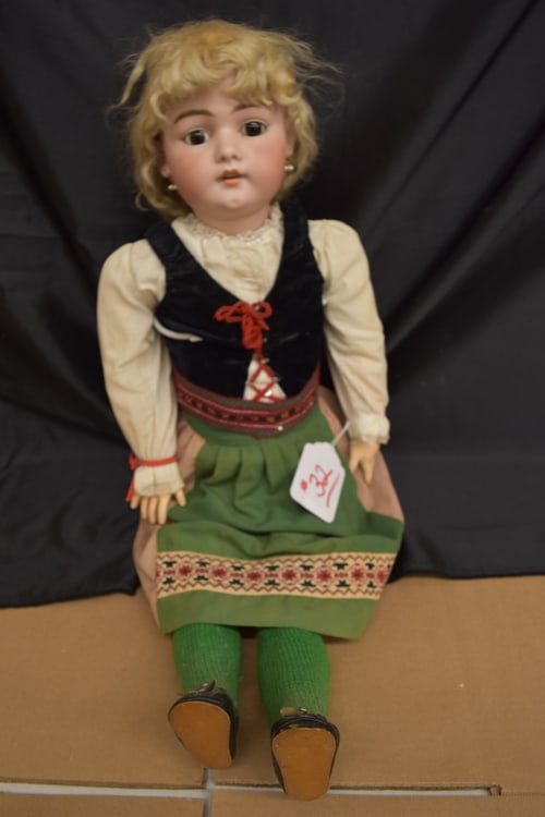 SIMON & HALBIG DOLL: 28" S & H 1079, SIZE 14 BLONDE BISQUE ON COMPO BJB, STAMPED EXCELSIOR #70685, PIERCED EARS, BROWN FIXED EYES, O/M W/4 TEETH, WEARING A VINTAGE SWISS GREEN & TAN SKIRT W/WHITE BLOUSE, BLACK VELOUR VEST