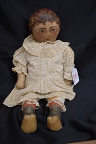 ANTIQUE OIL CLOTH HEAD DOLL