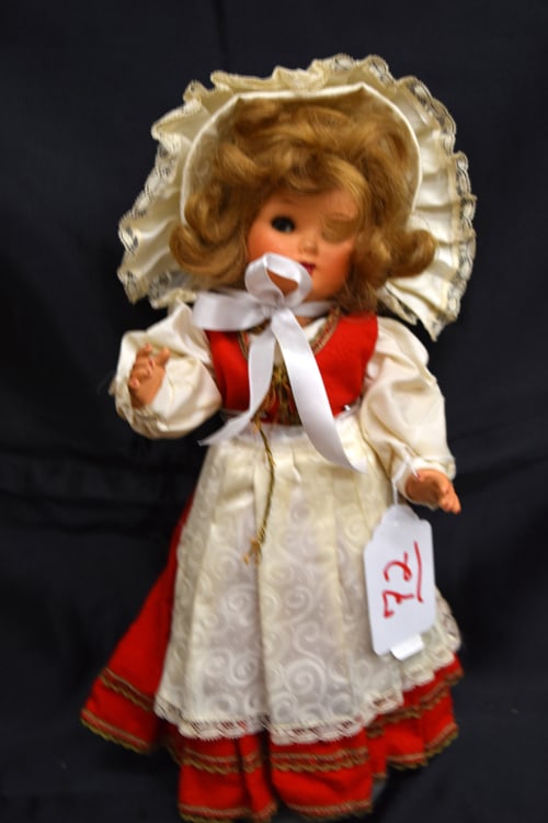 PTD BISQUE DOLL: 15" PAINTED BISQUE DOLL W/CELLULOID ARMS AND LEGS IN RED ETHNIC DRESS W/ WHITE APRON AND MATCHING HAT