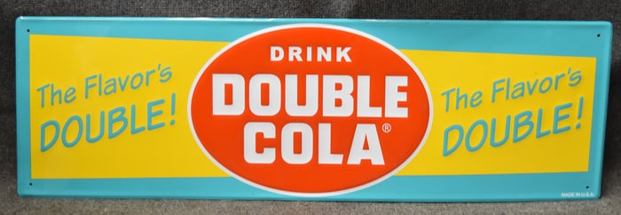 "DRINK DOUBLE COLA THE FLAVORS DOUBLE" SIGN
