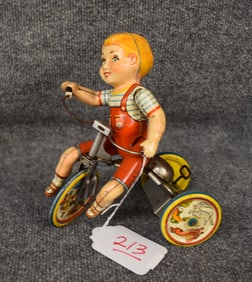 UNIQUE ART KIDDY CYCLIST TIN WIND UP TOY