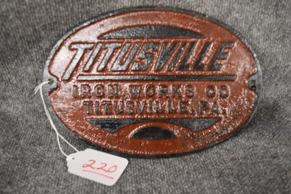 OVAL CAST IRON "TITUSVILLE IRON WORKS PLAQUE