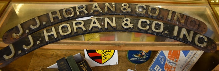 J.J. HORAN & CO. INC CAST IRON CURVED SIGNS