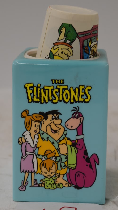 JETSONS/FLINTSTONE CUP HOLDER: JETSONS AND FLINTSTONES PLASTIC SMALL DIXIE CUP DISPENSER CIRCA 1990