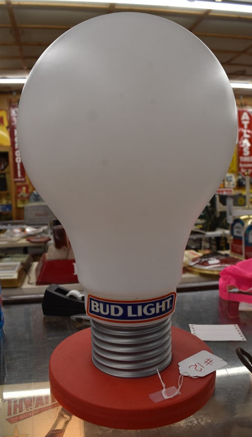 BUDWEISER BANK: PLASTIC BUD LIGHT LIGHT BULB SHAPED BANK