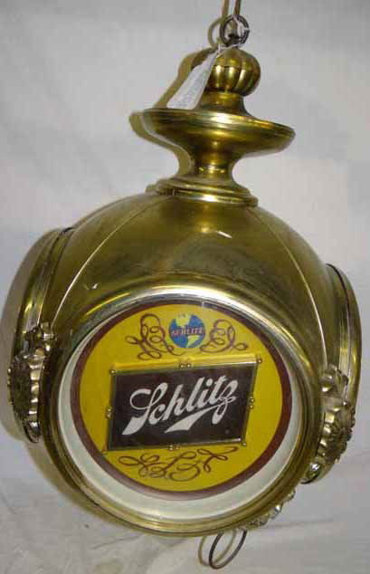 Schlitz Porthole/Clock: Schlitz Hanging Porthole/Clock, Light - Porthole is plastic & has 4 sides- 3 sides are Advertising -other side is a clock - 25"H x 16"W