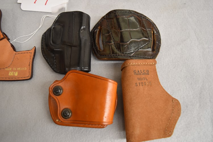 LEATHER HOLSTERS AND BELT (1 of 1)