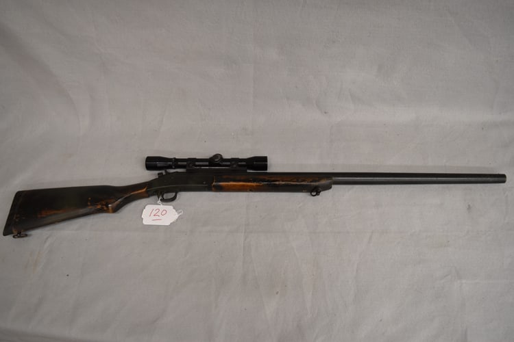 NEW ENGLAND FIREARMS 10 GA SHOTGUN: NEW ENGLAND FIREARMS SINGLE SHOT 10 GAUGE SHOTGUN SERIAL #NB259924 HAS A 31 1/2" BARREL, MOUNTED 4X ALL AMERICAN PERMA CENTER VINTAGE SCOPE, HAS PAINT ON HARD WOOD STOCK AND IS IN USED CONDITION