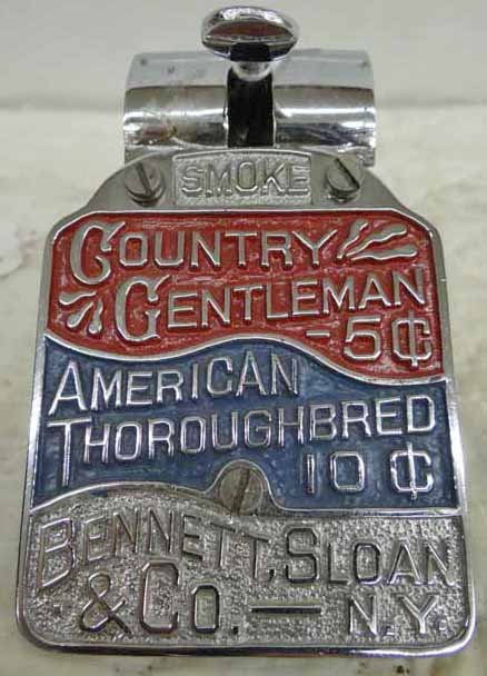 Cigar Cutter: Chrome Advertising Cigar Cutter Dated 1891, By The Brunhoff Co., Advertises Country Gentleman 5 Cents, American Thoroughbred 10 Cents, Bennett Sloan & Co,3" x 4 1/2" x 3"