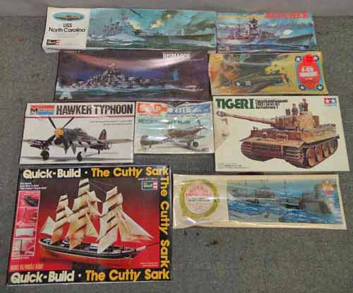 (9) Plastic Models: Group Of (9) Plastic Models To Inc: Airplanes, Tanks, Ships, Made By Revell, Timya, AHM, Aurora, Lindbergh, Monogram & Snap Tite, (3) Unopened Ship Models, (3) Unopened Airplane Models, (1) Open Ship