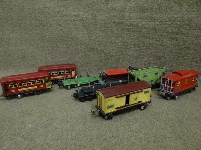 Lionel Train Items: Lionel Pullman Car #629, Observation Car #630, Box Car #655, Flat Car #2651, Dump Car #3659, Flat Car #3651, Dirt Car #653 & Caboose #657