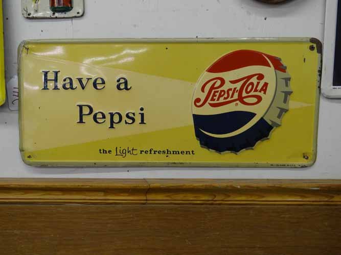Pepsi Sign: Tin 1958 "Have a Pepsi The Light Refreshment" Sign w/Bottle Cap Design