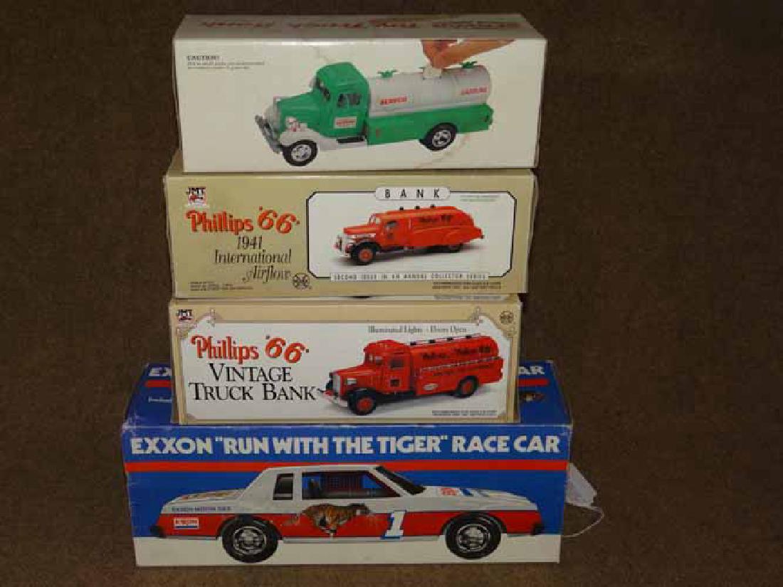 (4) Banks & Cars in Orig Boxes: (4) Banks & Cars in Orig Boxes to Inc: Exxon Tiger Race Car, Servco Tanker Bank & (2) Phillip Tanker Banks