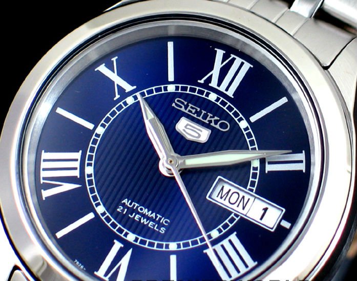 Seiko 5 Men watch - Roman Blue: 100% AUTHENTIC AND BRAND NEW SEIKO MEN AUTOMATIC SEE THROUGH ROMAN BLUE DIAL STEEL WATCH SNKL31K1.rnrnSEIKO MENS WATCH, NEVER NEED BATTERY, SEIKO 7S26 AUTOMATIC MOVEMENT, PUSH BUTTONS DEPLOYMENT CLASP