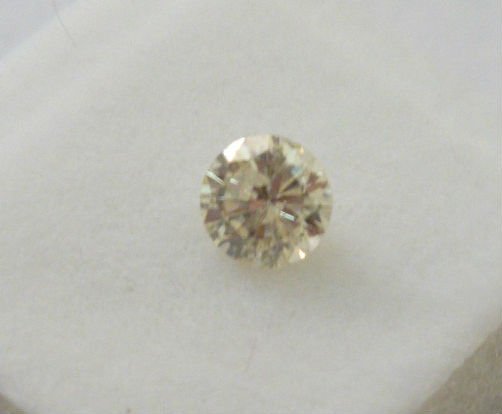 Fancy Yellow Diamond 0.60 ct - No Treatment: Fancy Yellow Diamond 0.60 ct - SI.....natural yellow color..Great luster fire....100% earth mined...no treatment in any way.; msrp 5500