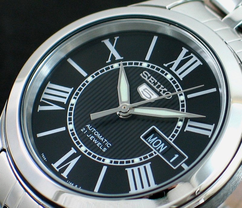 Seiko Men Black Roman Watch: 100% AUTHENTIC AND BRAND NEW SEIKO MENS AUTOMATIC SEE THRU BLACK ROMAN STEEL WATCH SNKL35K1. NEVER NEED BATTERY, PUSH BUTTONS DEPLOYMENT CLASP, DAY AND DATE CALENDAR, LUMIBRITE HANDS AND MARKERS, ROMA