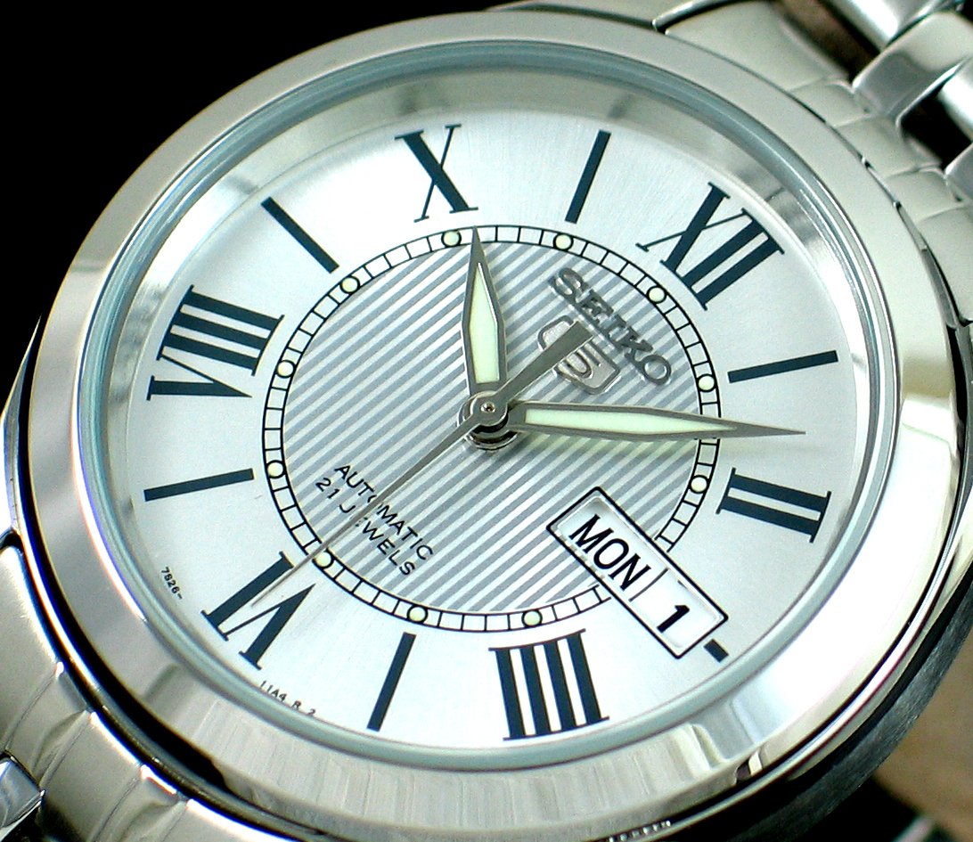 Seiko Silver Roman Watch: 100% AUTHENTIC AND BRAND NEW SEIKO MENS WATCH, NEVER NEED BATTERY, PUSH BUTTONS DEPLOYMENT CLASP, DAY AND DATE CALENDAR, LUMIBRITE HANDS AND MARKERS, ROMAN MARKERS, SCRATCH RESISTANT HARDLEX CRYSTAL, 