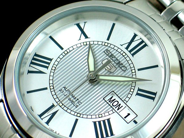 Seiko Silver Roman Watch: 100% AUTHENTIC AND BRAND NEW SEIKO MENS WATCH, NEVER NEED BATTERY, PUSH BUTTONS DEPLOYMENT CLASP, DAY AND DATE CALENDAR, LUMIBRITE HANDS AND MARKERS, ROMAN MARKERS, SCRATCH RESISTANT HARDLEX CRYSTAL, 